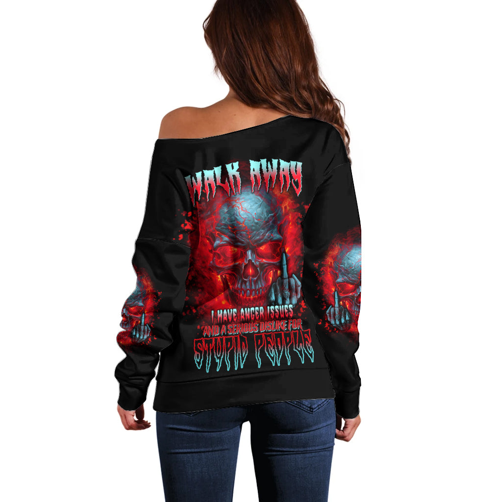 Women's off-shoulder black sweater with red and blue skull graphic, back view