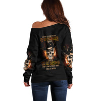 Black off-shoulder sweatshirt with long sleeves and large back skull graphic