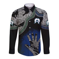 Multicolor long-sleeve button shirt on black with Aboriginal-style graphic, front