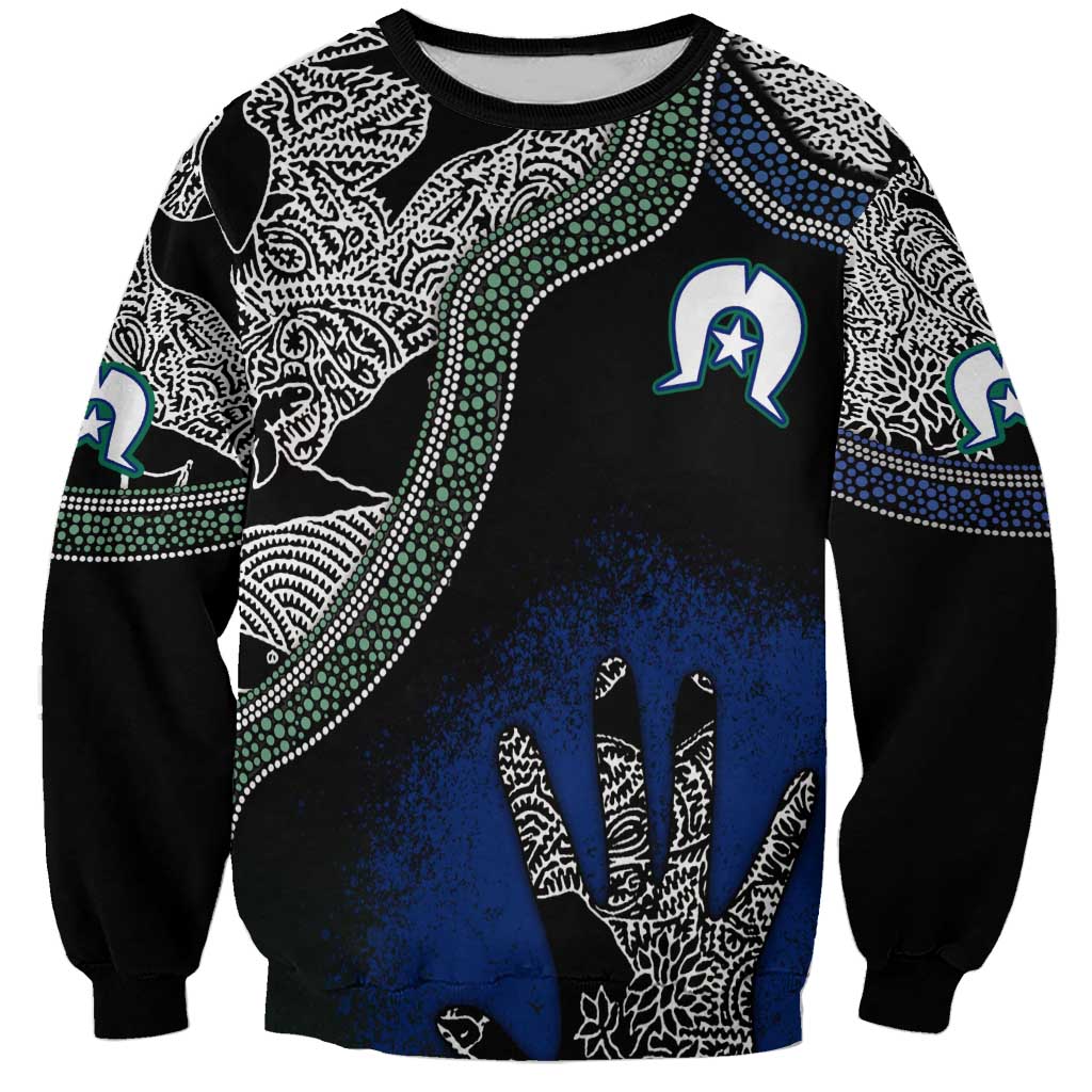 Unisex black sweatshirt with white patterned artwork, blue handprint and green star accents