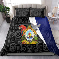 Black patterned bedding set with coat of arms crest and draped blue-and-white stripe