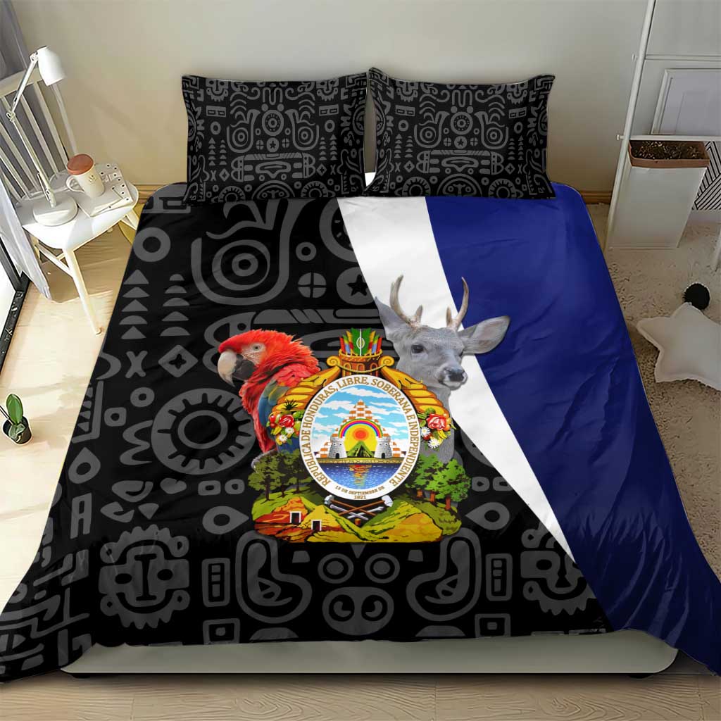 Black patterned bedding set with coat of arms emblem and blue-and-white diagonal panel
