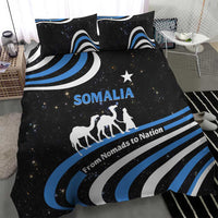Black duvet and pillows with SOMALIA text, star, camel silhouettes and blue wave stripes
