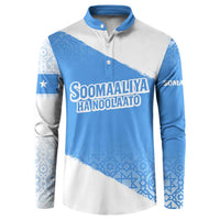 Blue and white button-front sweatshirt with graphic front panel and long sleeves