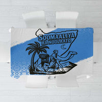 Blue and white tablecloth with central Somali graphic, palm, and moon motif