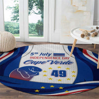 Round rug with blue red white flag waves, '5th July Independence Day' and '49'