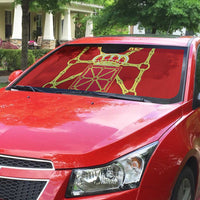 Red auto sun shade with gold crest on windshield, full-width