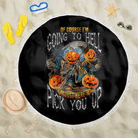 Round black beach blanket with orange pumpkin skull artwork and white tasseled edge