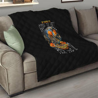 Black quilted Halloween quilt with centered skull-pumpkin design on diagonal diamond texture