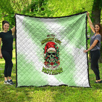 Green and white quilt with skull graphic and “On the Naughty List” text, diamond stitch