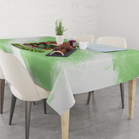 Green Christmas tablecloth with skull wreath print on dining table and corner drape