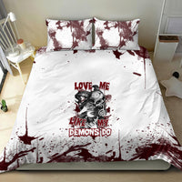 Skull bedding set with duvet and pillows; white with burgundy splash design and text.