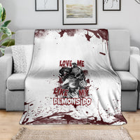 Skull graphic blanket in white with dark red splatter and bold “LOVE ME LIKE MY DEMONS DO” text