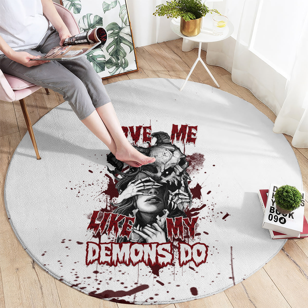Round white skull graphic rug with red text and black-gray portrait, splatter style