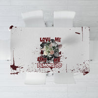 Skull tablecloth with bold text and floral skull graphic, maroon splatter borders