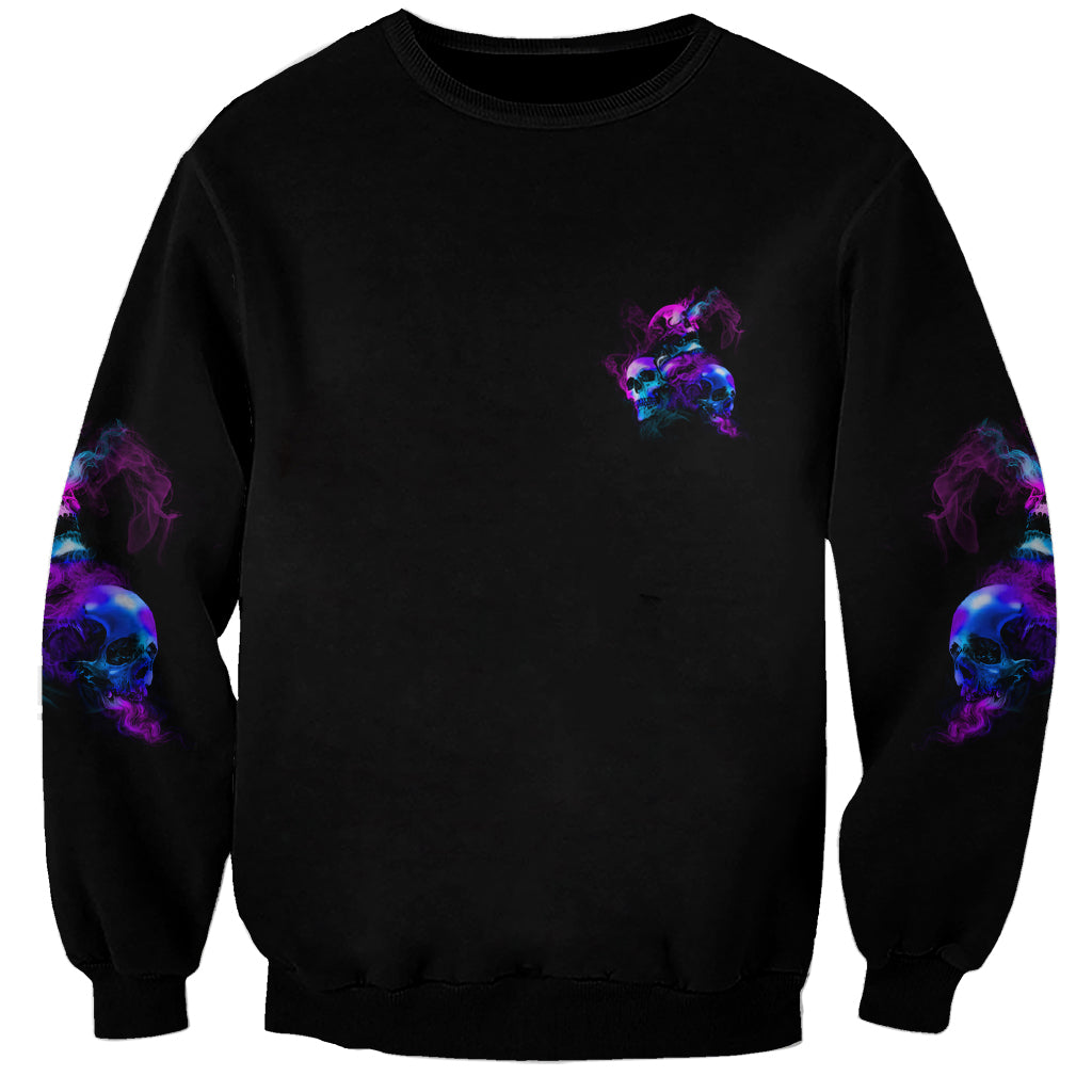 Black unisex sweatshirt with small purple-blue skull on front and skull graphics on sleeves