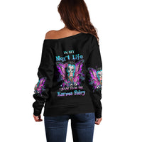 Black off-shoulder sweater with multicolor fairy skull back print and long sleeves