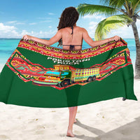 Green sarong wrap with colorful truck-art striping and Pakistan Truck text