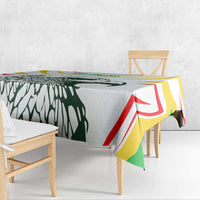 Tablecloth with green-white-yellow-red stripe pattern and partial eagle motif