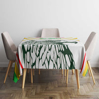 Square tablecloth with bold green eagle design and red, yellow, and white stripes