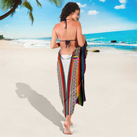 Multicolor woven sarong with bold vertical stripes and center geometric band