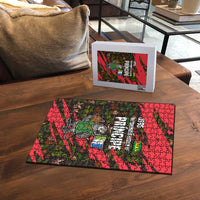 Jigsaw puzzle on wooden floor with parrot flag artwork and included box, 300 pcs