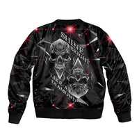 Black bomber jacket with large diamond skull graphic on back, ribbed hem and cuffs