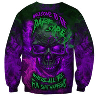 Purple crewneck sweatshirt with neon skull graphic and slogan text, long sleeves