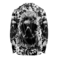 Black long-sleeve crewneck T-shirt with large skull graphic and dark abstract splatter