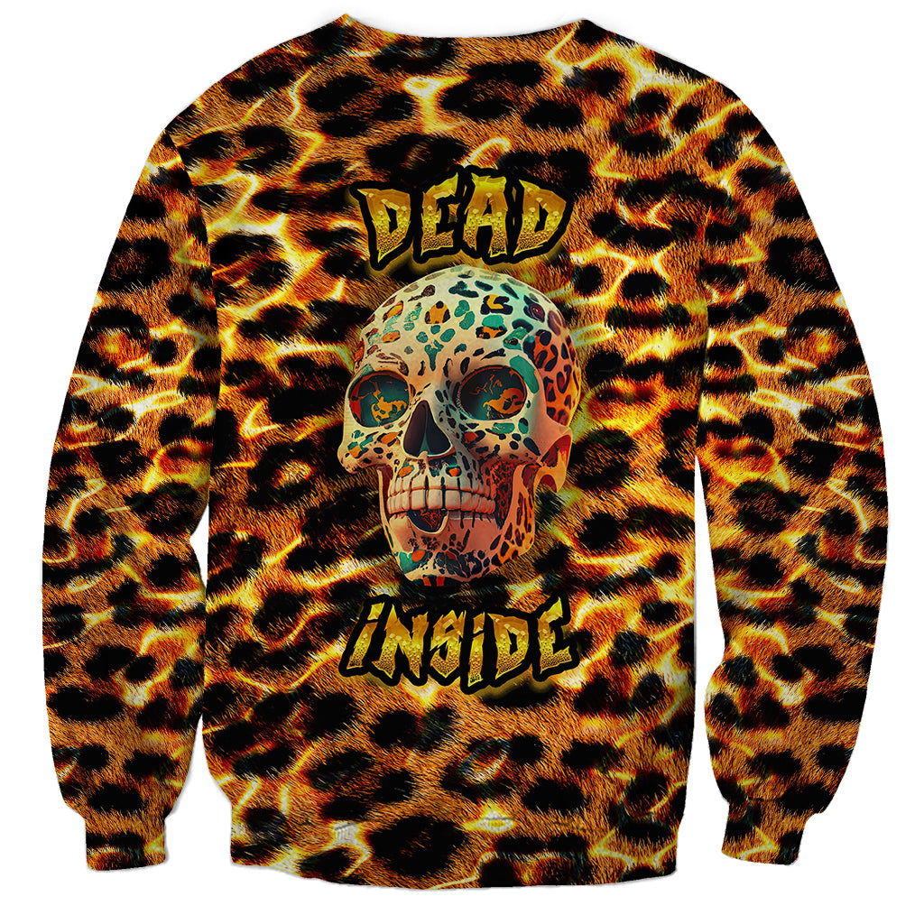 Leopard-print sweatshirt with dead skull graphic and yellow text, long sleeves