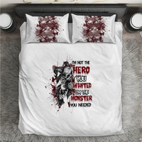 White bedding set with dark monster hero graphic, two square pillowcases and duvet