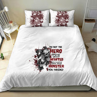 White bedding set with dark monster hero character graphic centered on duvet