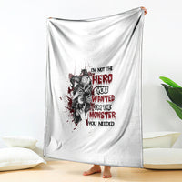 White throw blanket featuring black hero-and-monster portrait graphic with red lettering