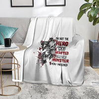 White blanket with black-and-red hero/monster portrait graphic and red slogan lettering