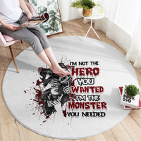 Light gray round carpet with black-and-red illustrated woman and bold slogan text