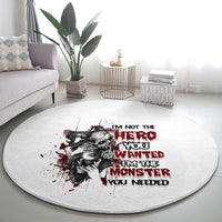 Round gray carpet featuring a black-and-red illustrated woman with bold slogan lettering