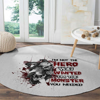 Gray textured round carpet with centered red/black quote text and illustrated woman