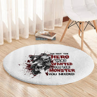 Round gray carpet with black and red comic-style woman graphic and stacked slogan