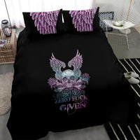 Black bedding set with winged skull, roses, and purple feathered wings on duvet