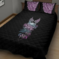 Black quilt bed set with quilted pattern and purple winged skull and rose graphic.