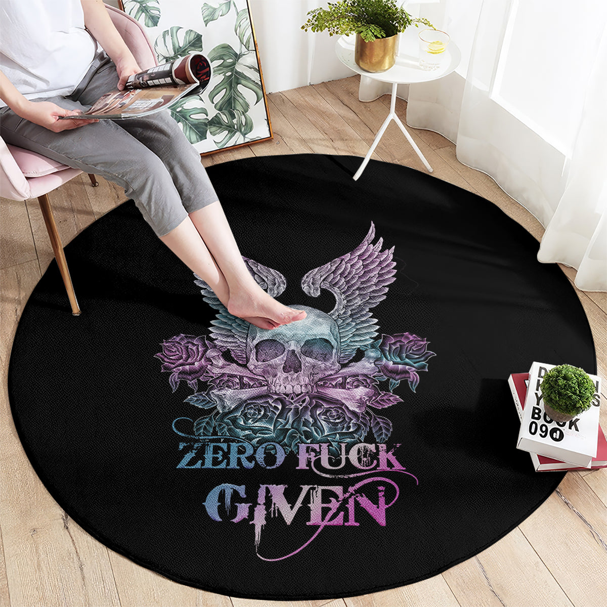 Round black carpet with skull and purple wings, roses, and “ZERO FUCK GIVEN” text