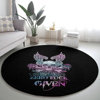 Round black carpet with skull and purple wings over roses and “ZERO FUCK GIVEN”