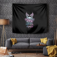 Folded black tapestry featuring skull with wings and roses plus “ZERO FUCK GIVEN” lettering