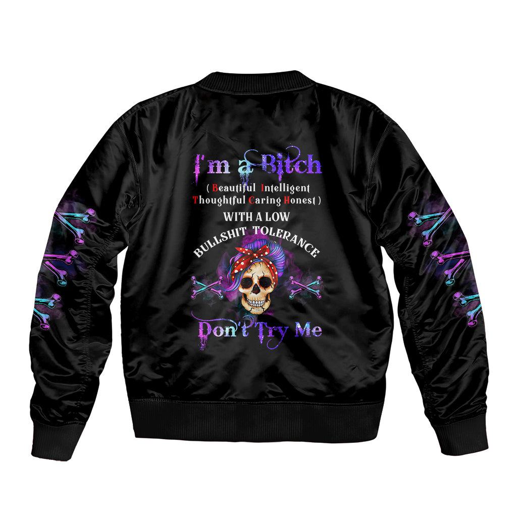 Black satin bomber jacket with large skull graphic on back, ribbed hem and cuffs
