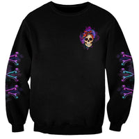 Black unisex sweatshirt with small colorful skull logo on chest and neon sleeve art