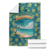 Tropical beach blanket laid flat with Bahamas logo, palm fronds, and ocean sunset