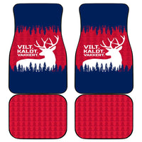 Set of car mats showing blue and red reindeer forest graphic and red textured backing