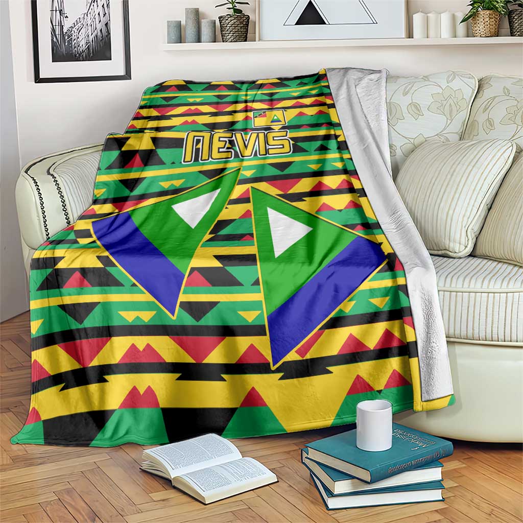 Geometric patterned blanket with triangular green, yellow, red stripes and crest emblem