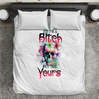White duvet bedding set with two matching pillowcases and a multicolor skull graphic