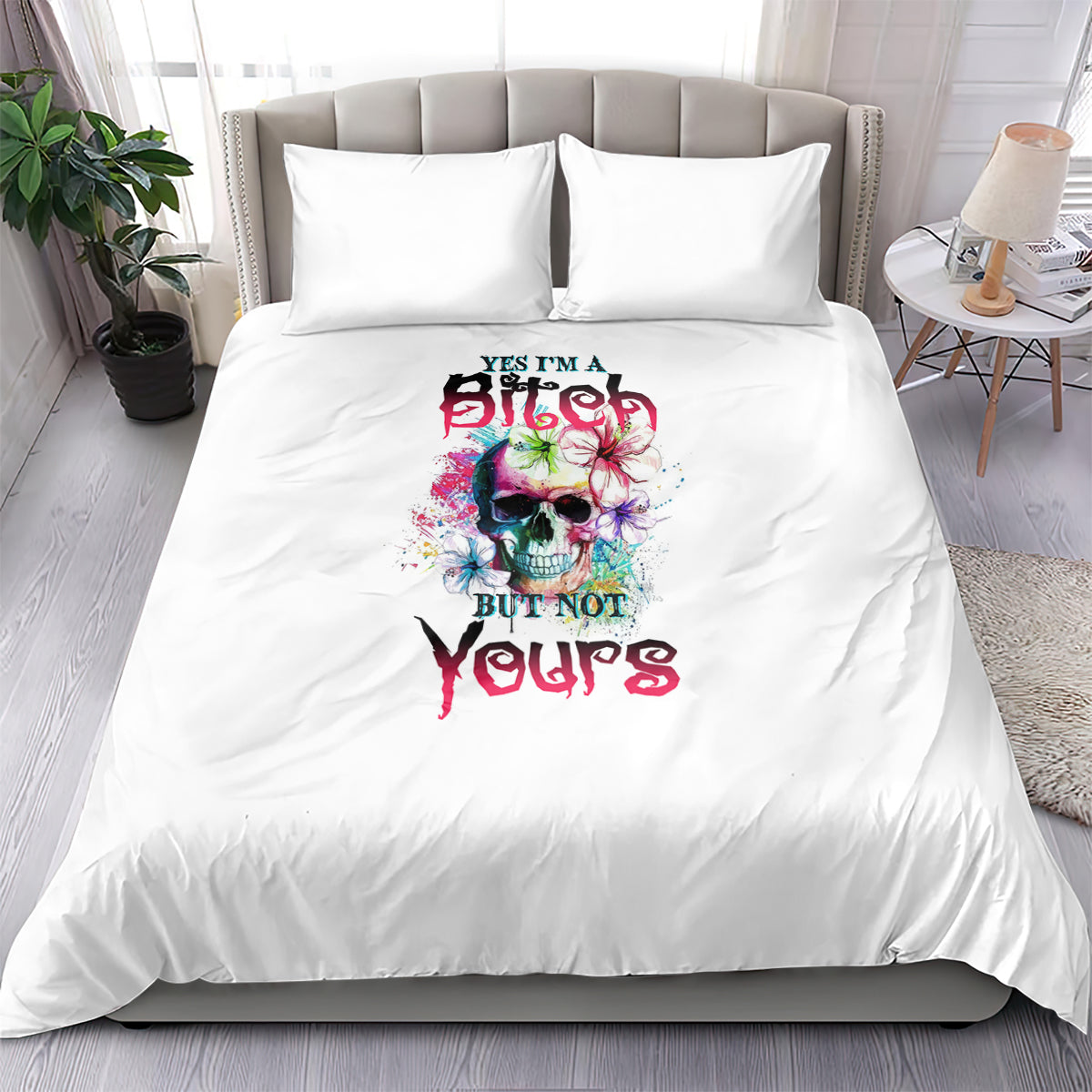 White duvet bedding set with two pillowcases, multicolor skull graphic and 'yours' text
